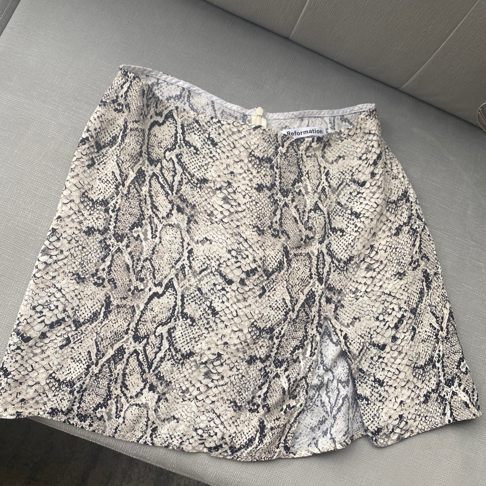 Reformation snake print skirt.